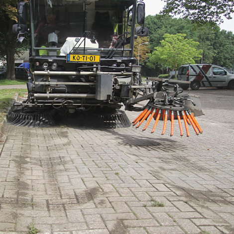 Weed brush with steel top plate